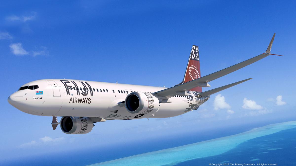 Fiji Airways branded 737 flying over coral reefs